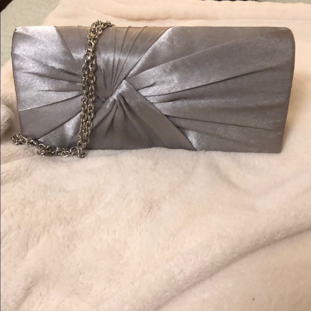 Like new silver clutch